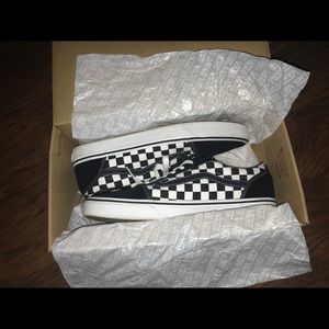 Black and white checkered Vans